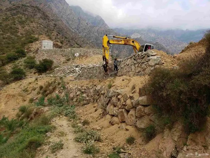 بوكلين لبنيان الحجر وقص الاراضي 8