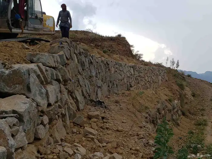 بوكلين لبنيان الحجر وقص الاراضي 6