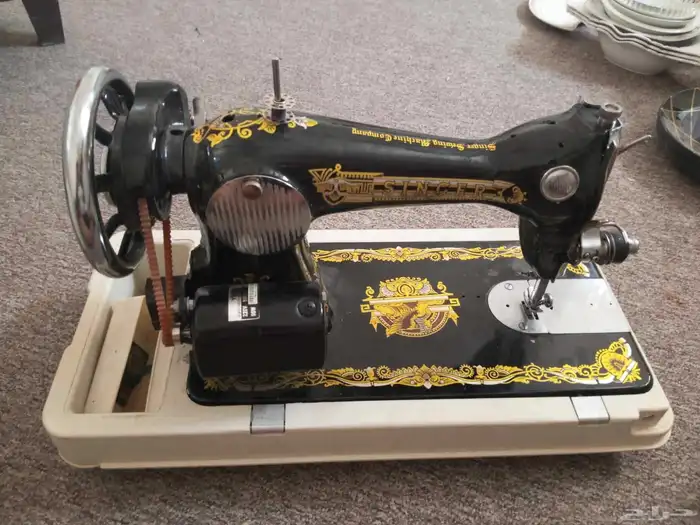 مكينه خياطه ملابس 1