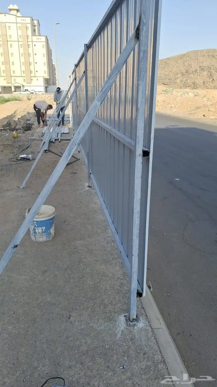 حداد أبواب ومظلات 7