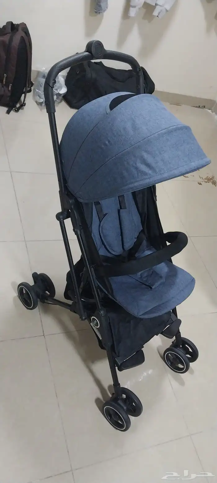 عربه اطفال شبه جديد 9