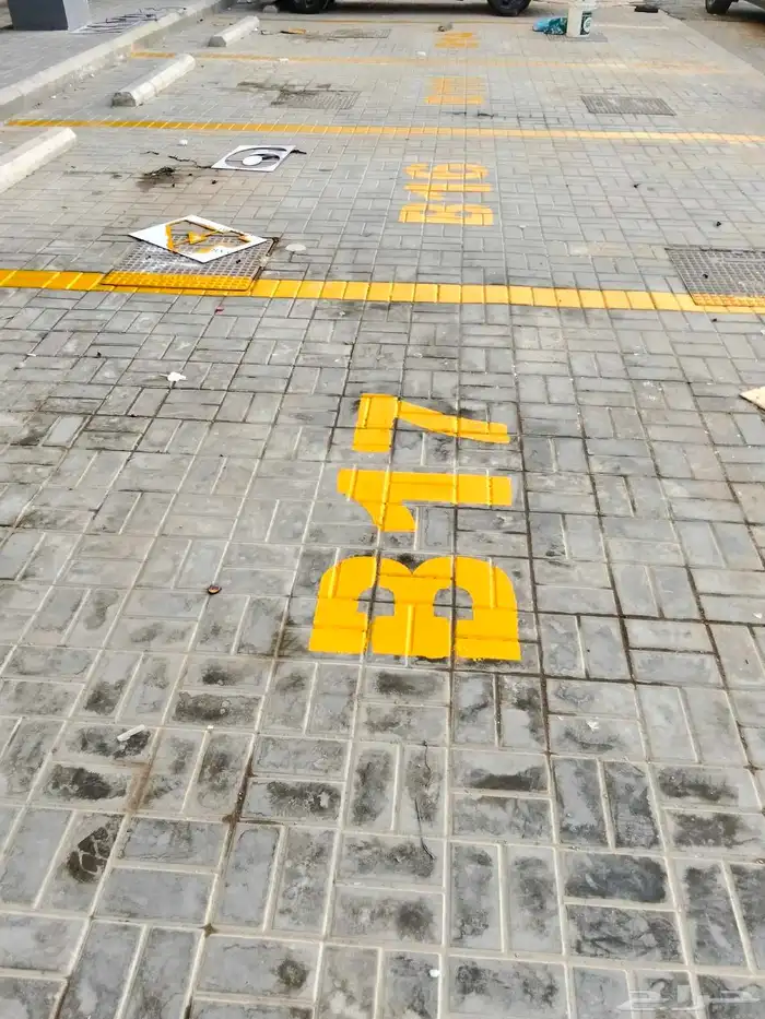 تخطيط مواقف السيارات مع رسم موقف ذوي الاحتياجات الخاصة 4