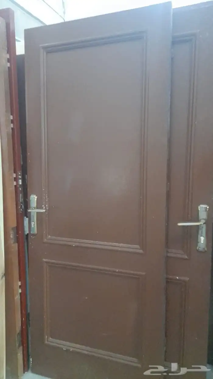 عندنا ابواب خشب مستخدمه وابواب حديد والمنيوم جديده للبيعه 2