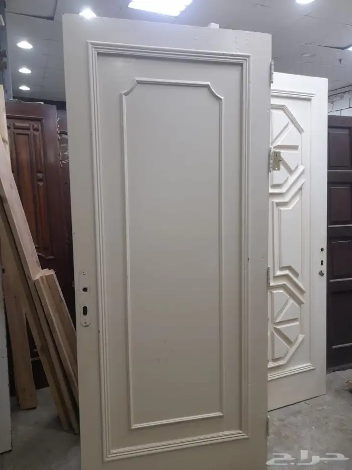 عندنا ابواب خشب مستخدمه وابواب حديد والمنيوم جديده للبيعه 5