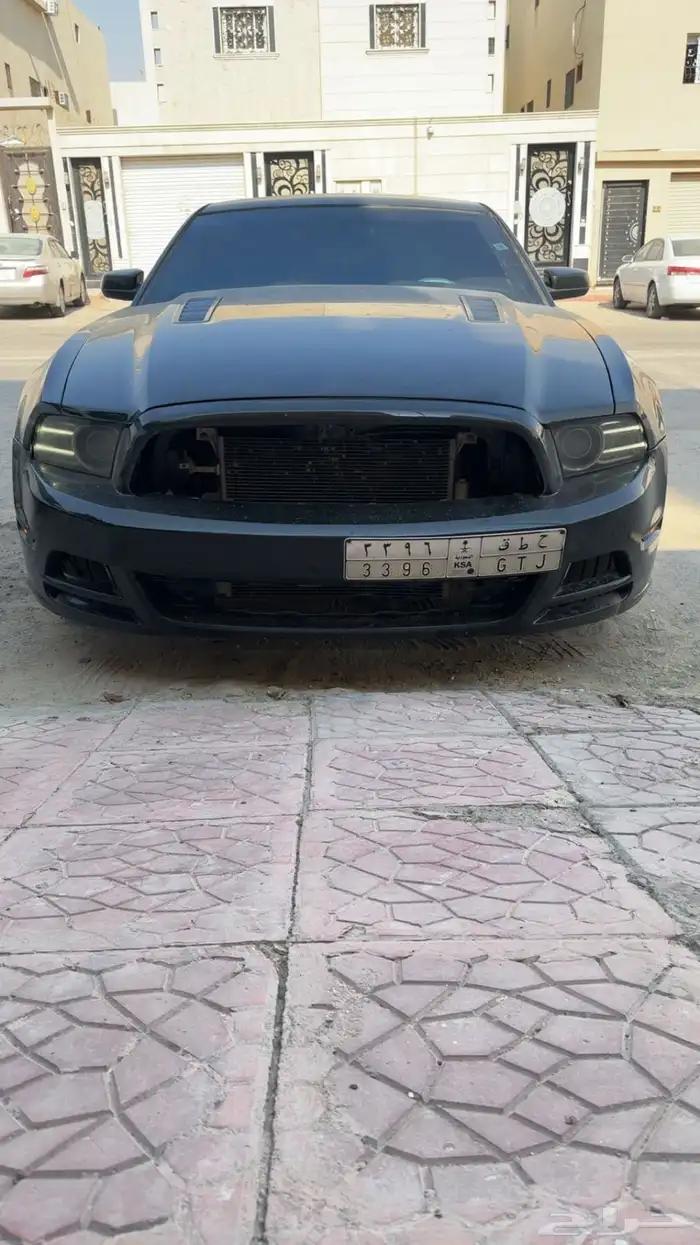 صدام موستنج14-13 1