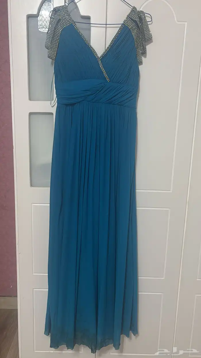 فستان سهره جميل   لم يلبس سوى مره واحده   لونه أزرق فاتح 0