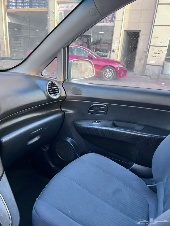 كيا كارينز 2013 8