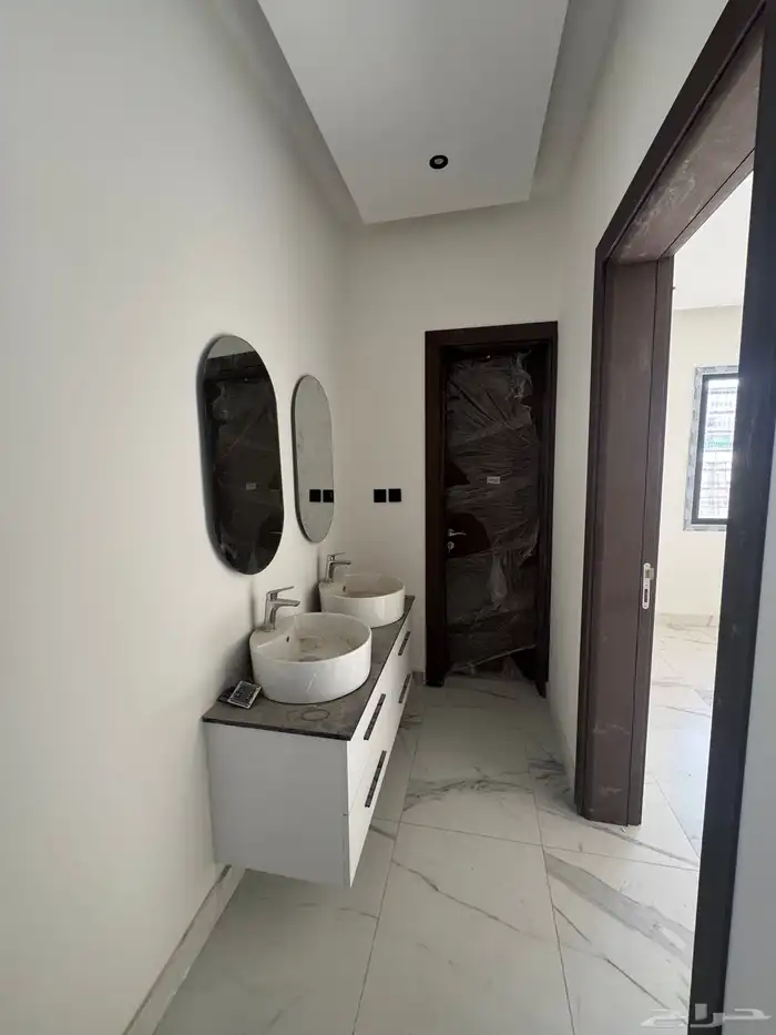 عمارة جديدة م للبيع بحي القادسية 18