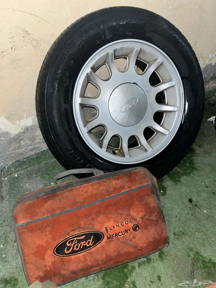 جنط فورد 98-99 اصلي نظيف وشنطة طوارئ 5