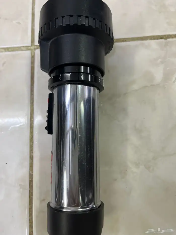 كشاف ابو هر قديم شغال في تكبير وتصغر الضوء يفك رأسه ويركب 1