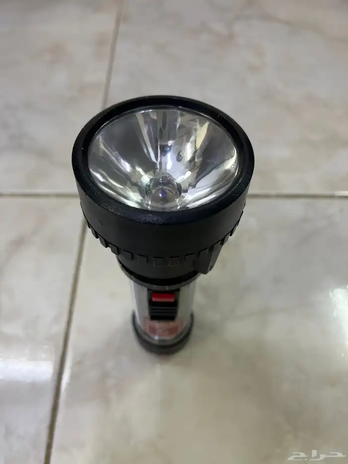 كشاف ابو هر قديم شغال في تكبير وتصغر الضوء يفك رأسه ويركب 5