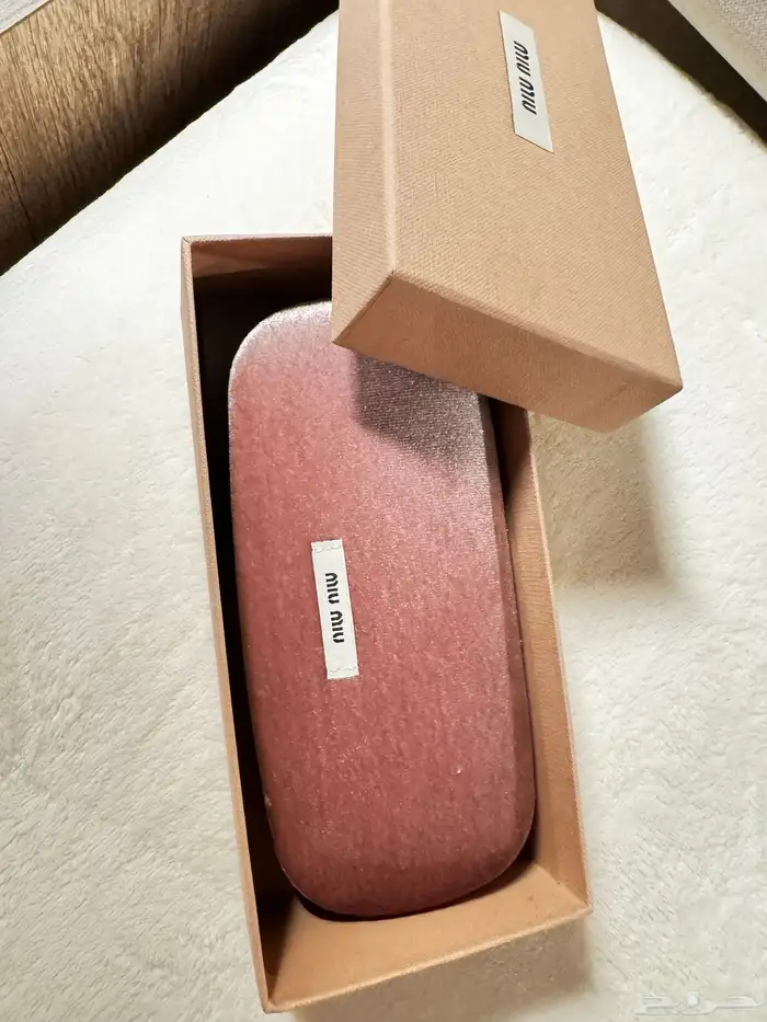 نظارة ميو ميو أصلية 100  سوداء الإطار 1