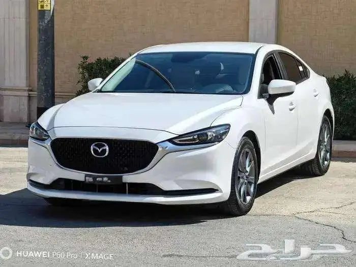 مازاد 6 مستعملة موديل 2023 بنزين حبه فقط لون ابيض 3