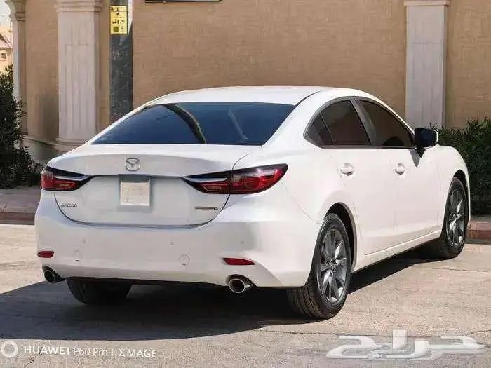 مازاد 6 مستعملة موديل 2023 بنزين حبه فقط لون ابيض 4