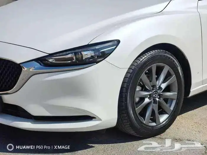 مازاد 6 مستعملة موديل 2023 بنزين حبه فقط لون ابيض 7