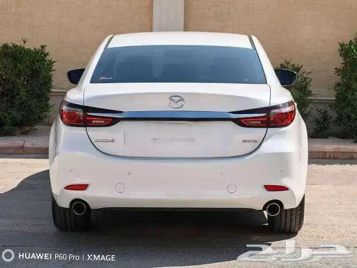 مازاد 6 مستعملة موديل 2023 بنزين حبه فقط لون ابيض 6