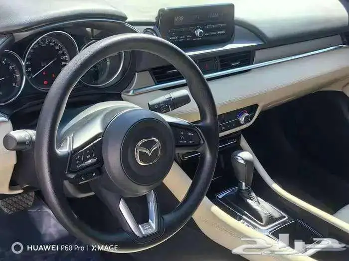 مازاد 6 مستعملة موديل 2023 بنزين حبه فقط لون ابيض 21