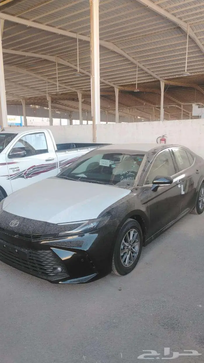كامريE 2025 اسود اصفار سعودي صادر لوحات ب109.500 ريال 0