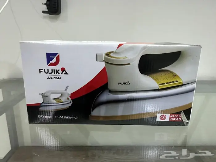 مكواة ملابس 0