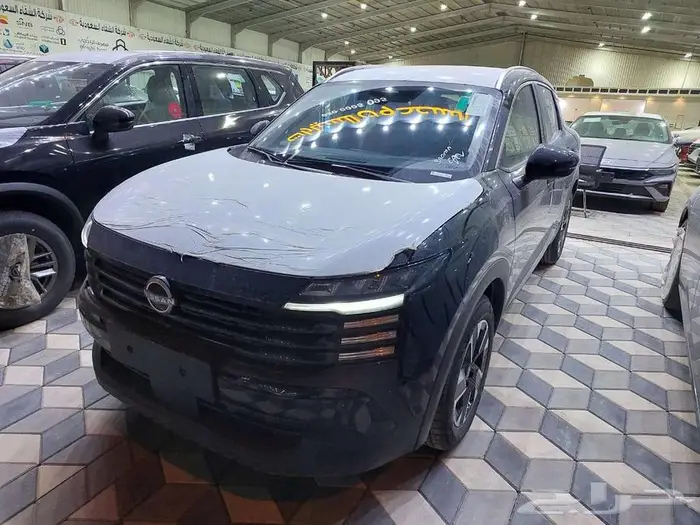 نيسان كيكس SV نص فل 2025 15