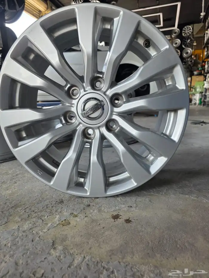 جنوط نيسان بلاتينيوم مقاس 18 اصلي وكاله 1