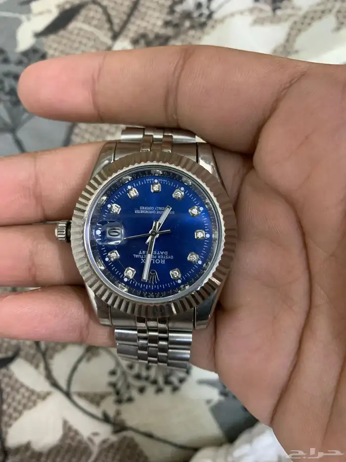 ساعه رولكس اصليه بس بدون ضمان وفتوره لأنها قديمه 0