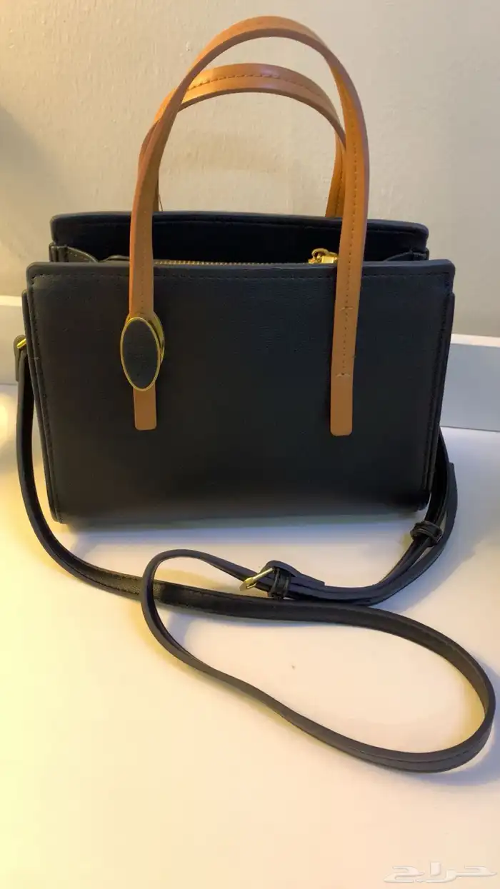 طقم شنطة و كعب نسائي براند معروف 2