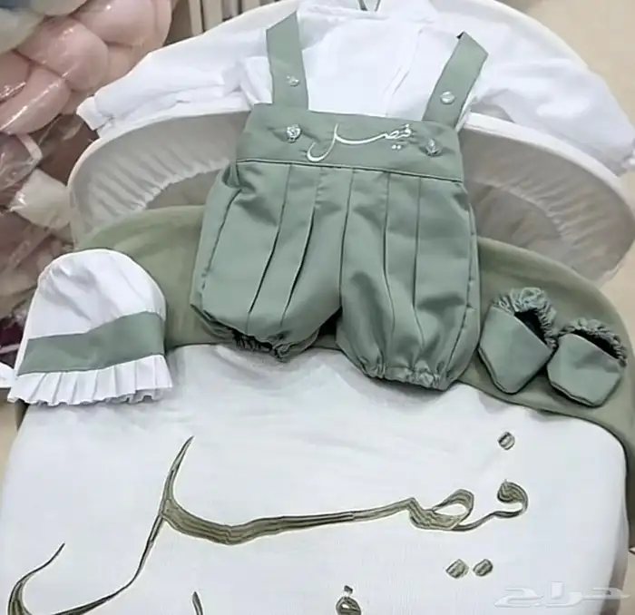 طقم مواليد باسم فيصل 0