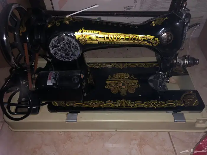 ماكينة خياطة ومكواه بخار 1