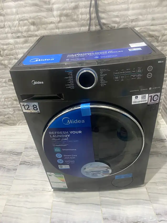 غساله ملابس ميديا 12 كيلو تجفيف 100 100 2