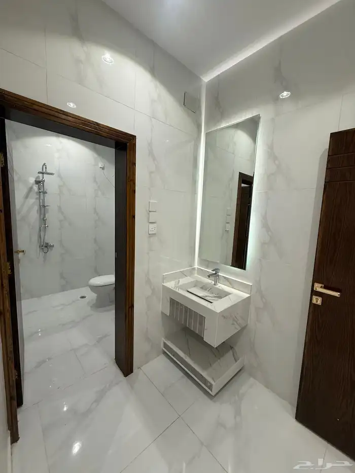 للبيع دور ارضي بحوش بعماره دورين حي الزهور المحاله ابها 19