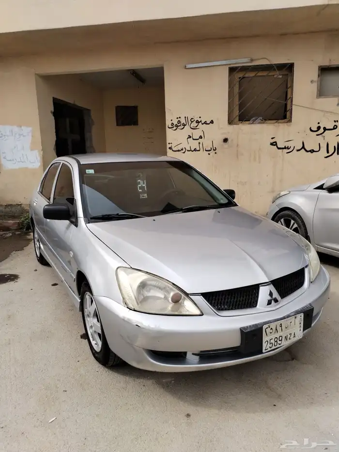 للبيع متسوبيشي لانسر موديل 2009 ممشي 300 سوبر اكشن 5