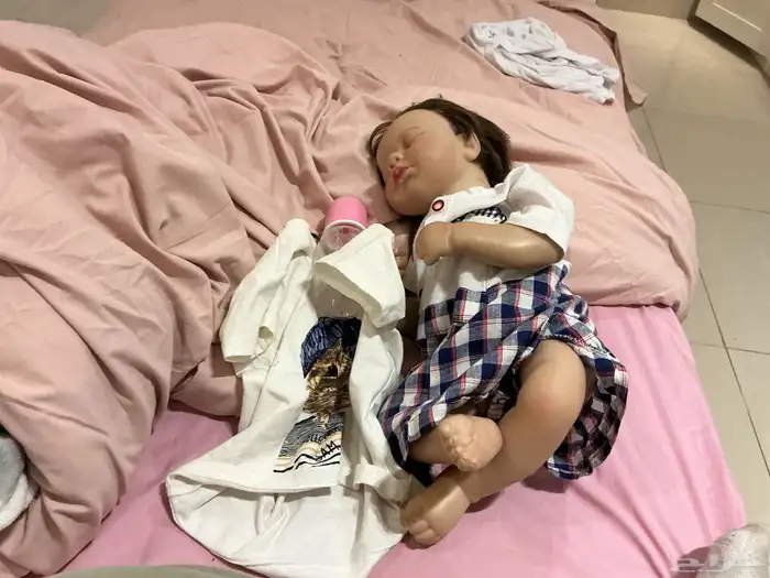 دمية سليكون مع ملابسين 0