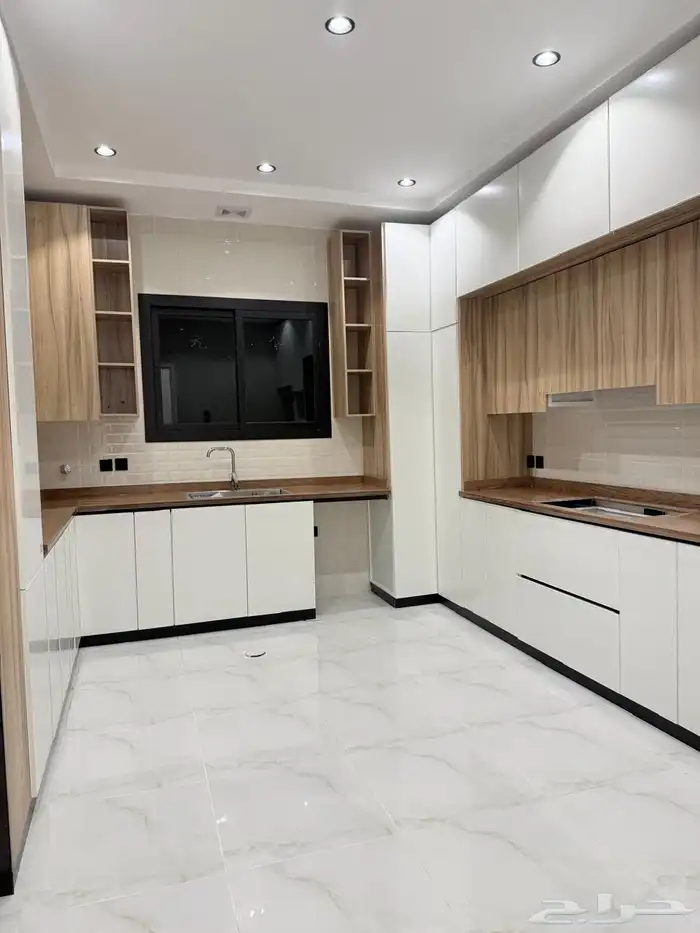 دور ارضي للبيع حي الاخضر من 6 غرف وصاله وحوش كبير 22