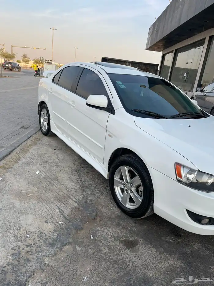 لانسر 2011 كمله فتحه سقف بصمه قير مكينه علي الشرط 2