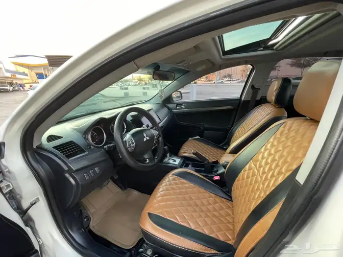 لانسر 2011 كمله فتحه سقف بصمه قير مكينه علي الشرط 4