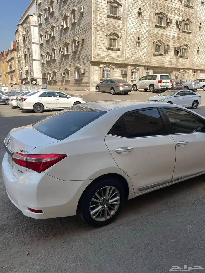 كورلا 2015 ابيض لؤلؤي GLI نص فل 6