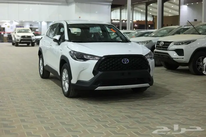 تويوتا كورولا كروس ستاندر ابيض هايبرد 2024 اقل سعر كاش وبنوك 1