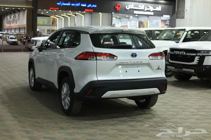 تويوتا كورولا كروس ستاندر ابيض هايبرد 2024 اقل سعر كاش وبنوك 24