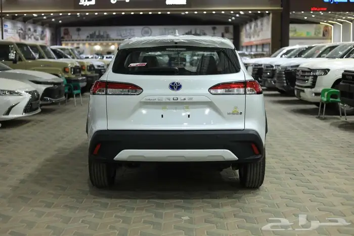 تويوتا كورولا كروس ستاندر ابيض هايبرد 2024 اقل سعر كاش وبنوك 26