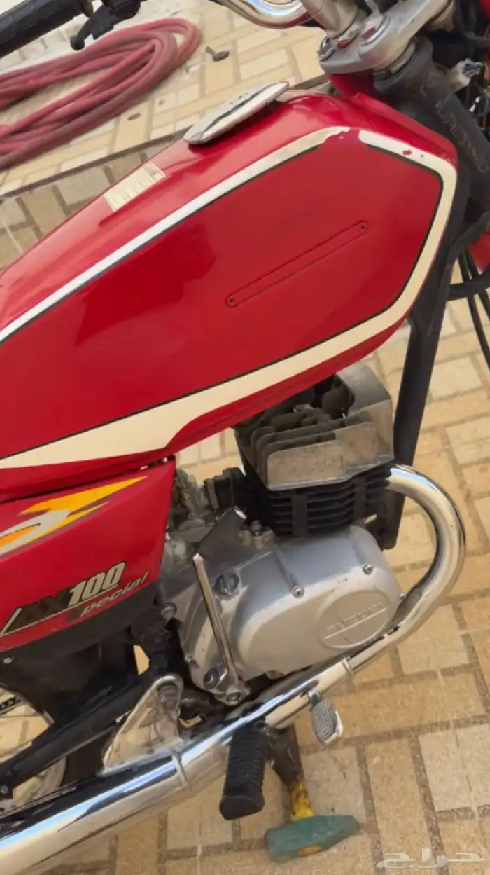 اكس 100 سوزوكي 2