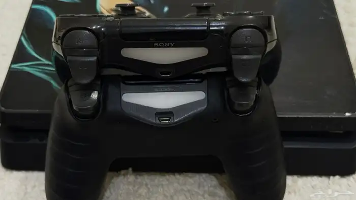 للبيع سوني slim (PS4) وشريط   فيفا24 وقراند5   وكود وردد 8