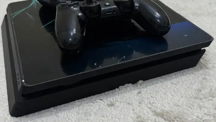 للبيع سوني slim (PS4) وشريط   فيفا24 وقراند5   وكود وردد 6