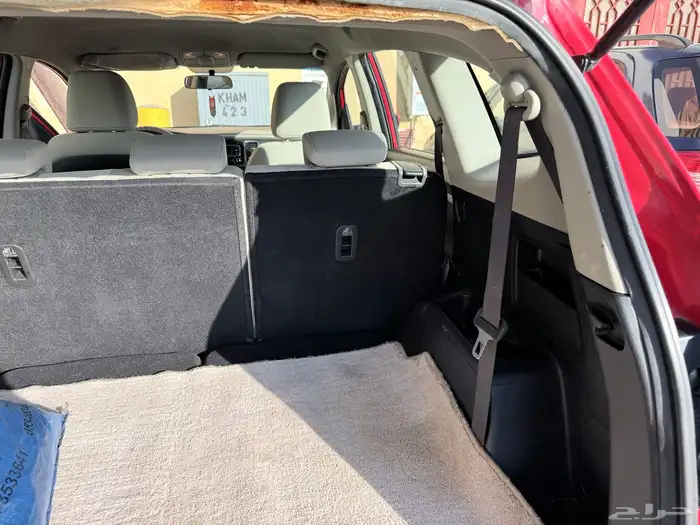 كيا كارنز 2015 حمراء للبيع 2