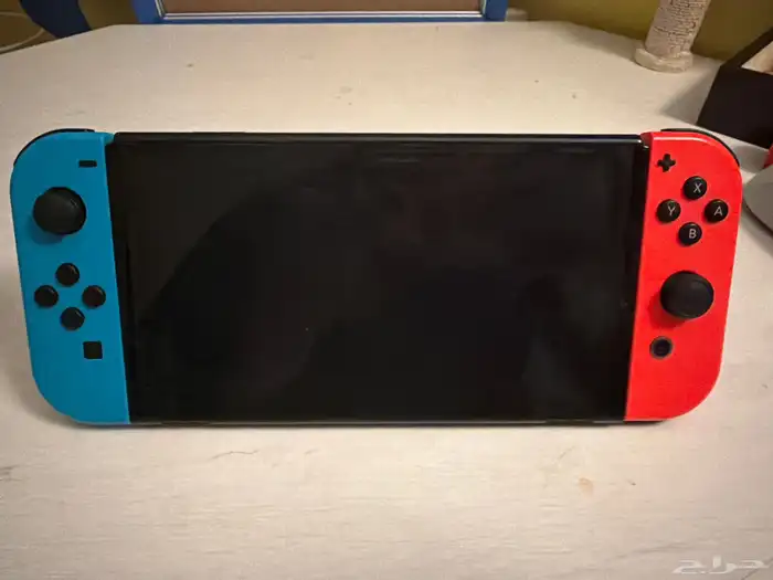 جهاز Nintendo Switch OLED مع اغراضه و مع شنطه 0