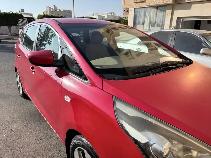 كيا كارنز 2015 حمراء للبيع 12