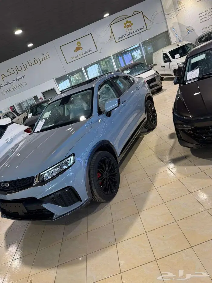 جيلي توجيلا 2025 GF اسود واسمنتي 1