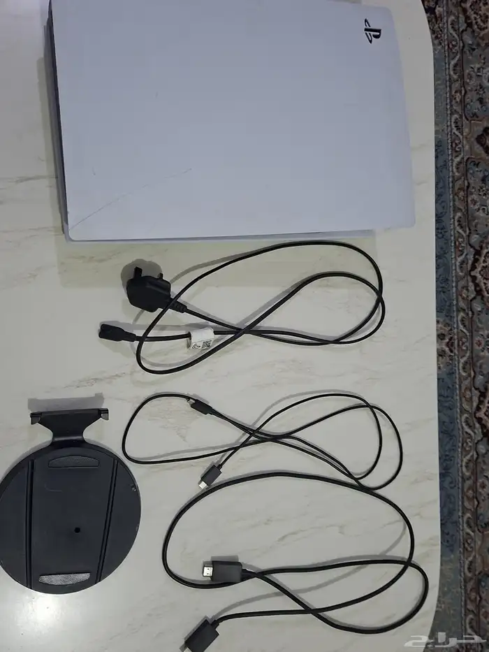 سوني5نسخة ديجتال فيه كسر بسيط ويده اصليه وشنطه سوني 2