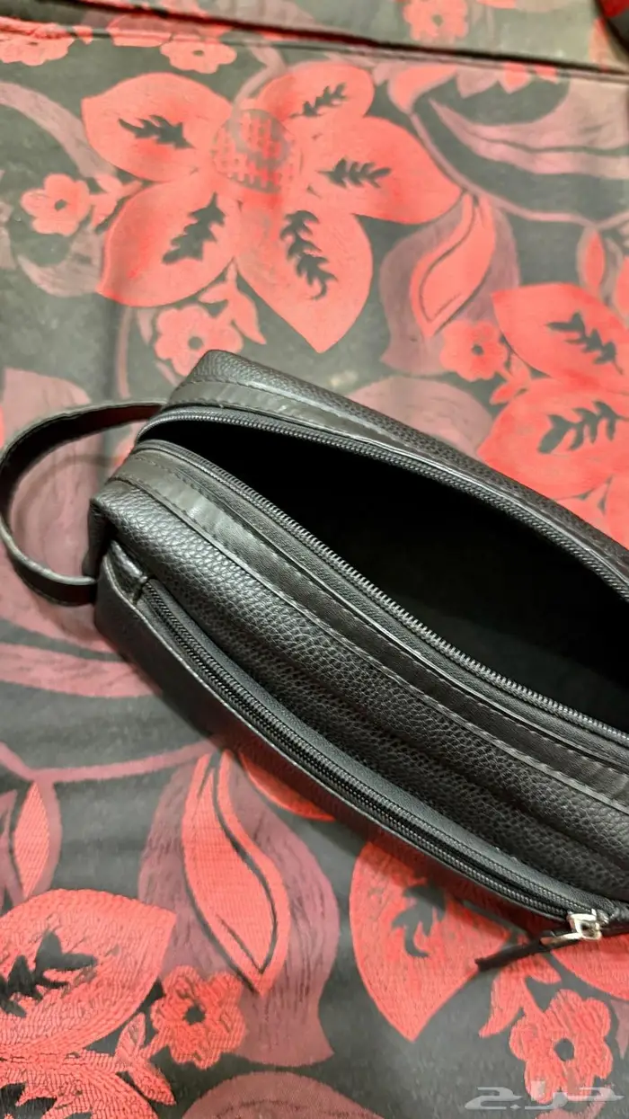 شنطه رجاليه تومي هيلفيغر 5