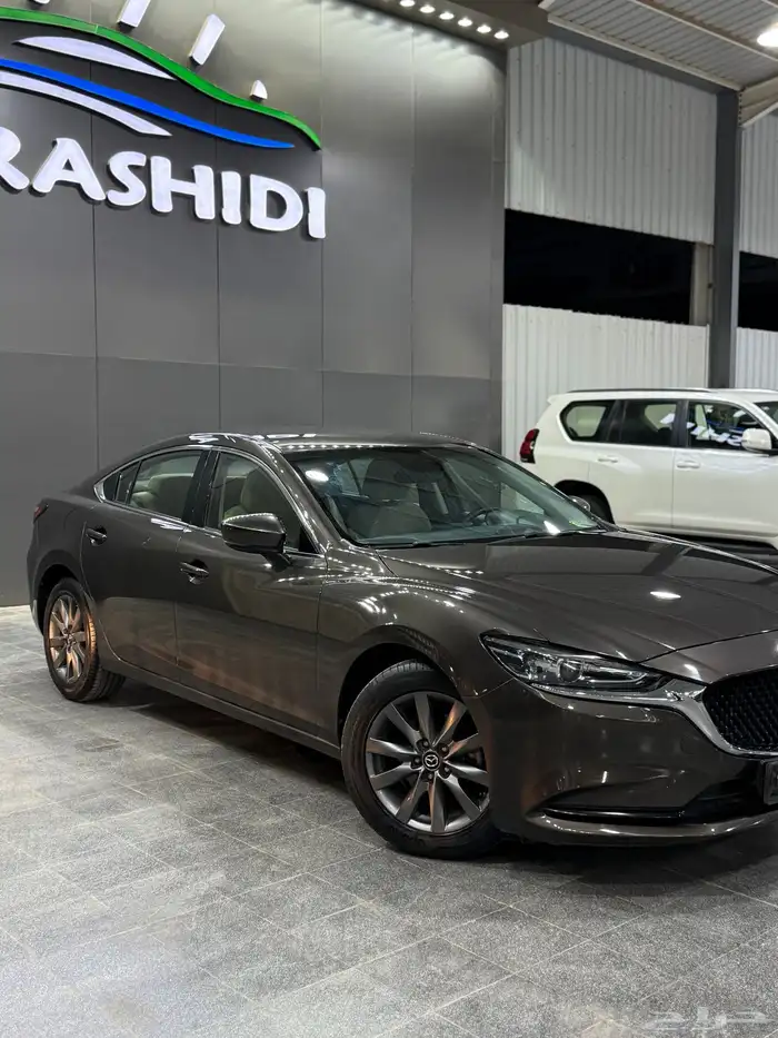مازدا زوم 6 2022 بني معدني لدى معرض(عبيد الرشيدي) 9